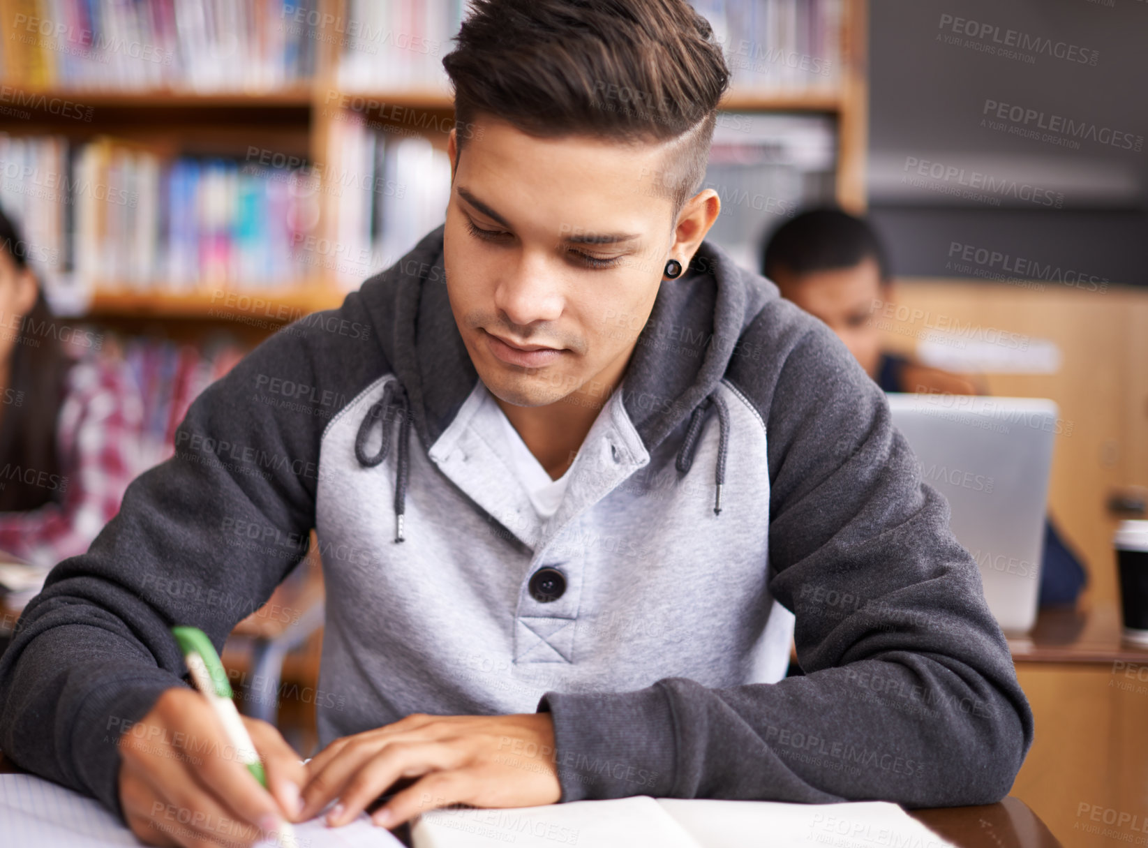 Buy stock photo Learning, writing and college with man in library for education, research and classroom quiz. Focus, study and notebook with male student on university campus for knowledge, scholarship and project