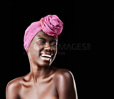 Buy stock photo Black woman, head wrap and laugh with natural beauty, skincare and cosmetics in studio. Traditional, turban and African style with wellness and skin glow in makeup with confidence and dark background