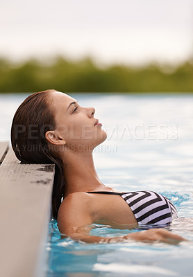 Buy stock photo Woman, thinking and relax in swimming pool on luxury holiday or vacation at hotel or villa in Cancun. Person, outdoor or enjoy calm water at resort in Mexico or girl in bikini or swimsuit with peace