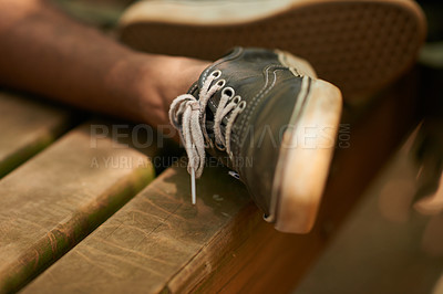 Buy stock photo Closeup, shoes and legs with sneaker in dust on wood to relax or chill on camping and tired with break. Outdoor, teen and person to rest for leisure or holiday in forest for hike, vacation and fun