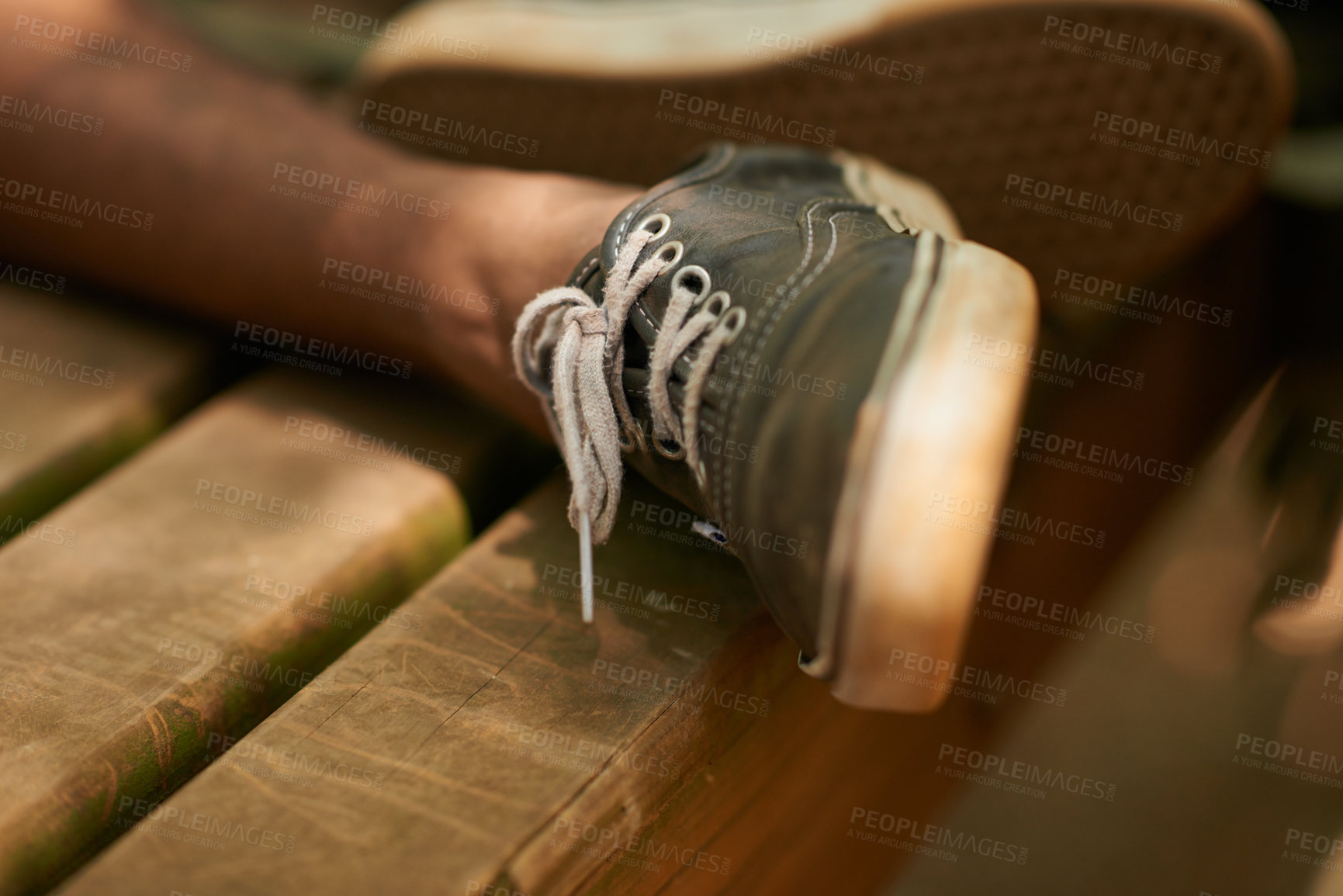 Buy stock photo Closeup, shoes and legs with sneaker in dust on wood to relax or chill on camping and tired with break. Outdoor, teen and person to rest for leisure or holiday in forest for hike, vacation and fun