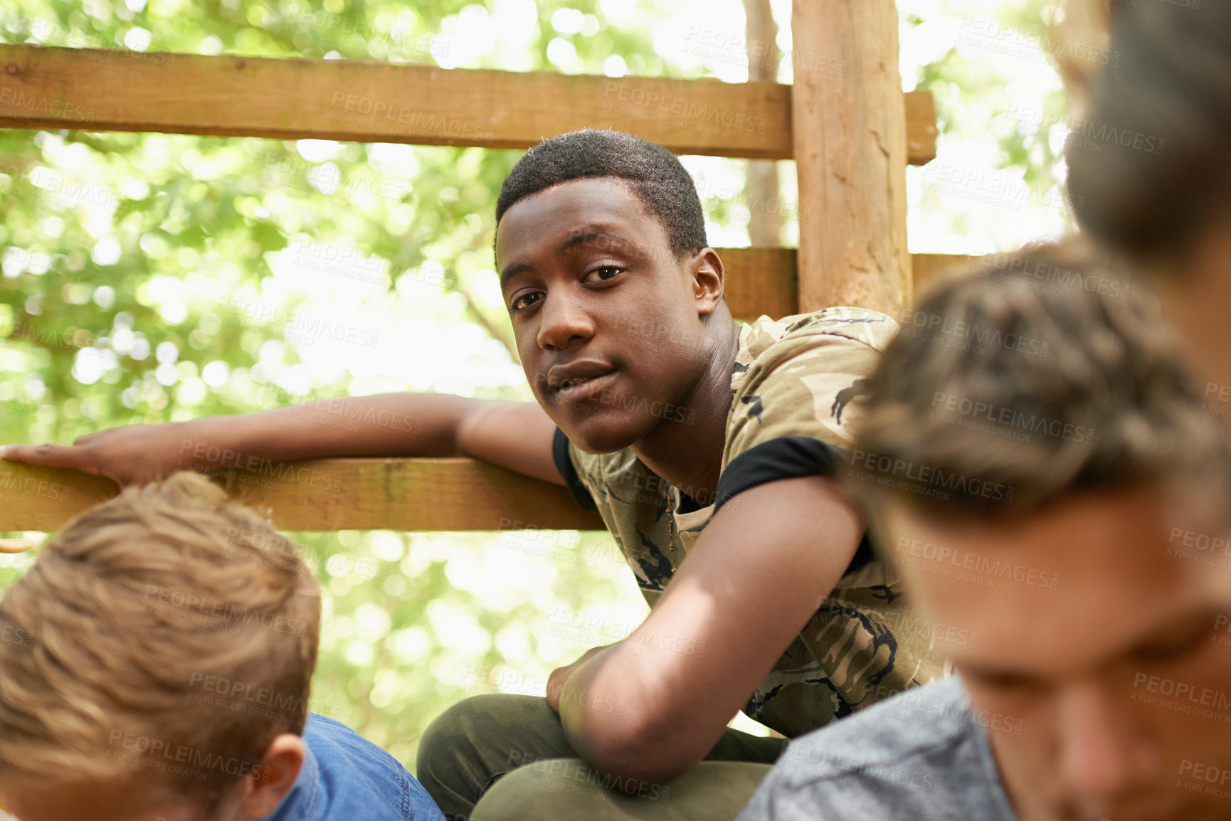 Buy stock photo Portrait, black boy and group with sunshine, park and fun with happiness and bonding together with weekend break. Face, people and teenagers with joy and summer with nature and forest with friends