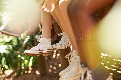 Buy stock photo Group, feet and sneakers outdoor in nature for friends connection or explore forest, bonding or travel. People, shoes and relax vacation in Australia for woods adventure or resting, holiday or calm
