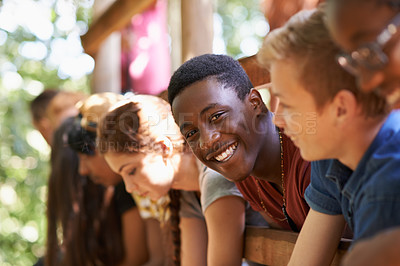 Buy stock photo Friends, boy and smile in portrait at camp, happy and social for support in treehouse. Black male person, nature and group of teens outdoors for bonding, team building and unity in forest on holiday