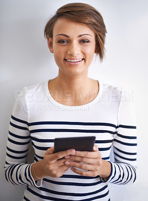 Buy stock photo Woman, studio or portrait with tablet, browsing and face for social media or communication. Girl, tech and smile with technology, online connection or internet message isolated on white background