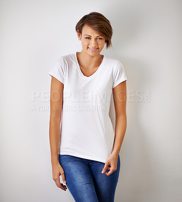 Buy stock photo A cropped portrait of a beautiful young woman in jeans and a t shirt