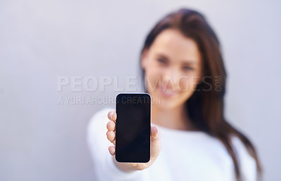 Buy stock photo Mockup, person and smartphone on gray background with screen for connectivity, communication and mobile with technology. Studio, cellphone and interaction with internet for chat or conversation