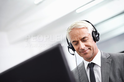 Buy stock photo Call center, happy and man in office with headset working on online telemarketing consultation. Smile, customer support and professional male consultant with crm service communication in workplace.