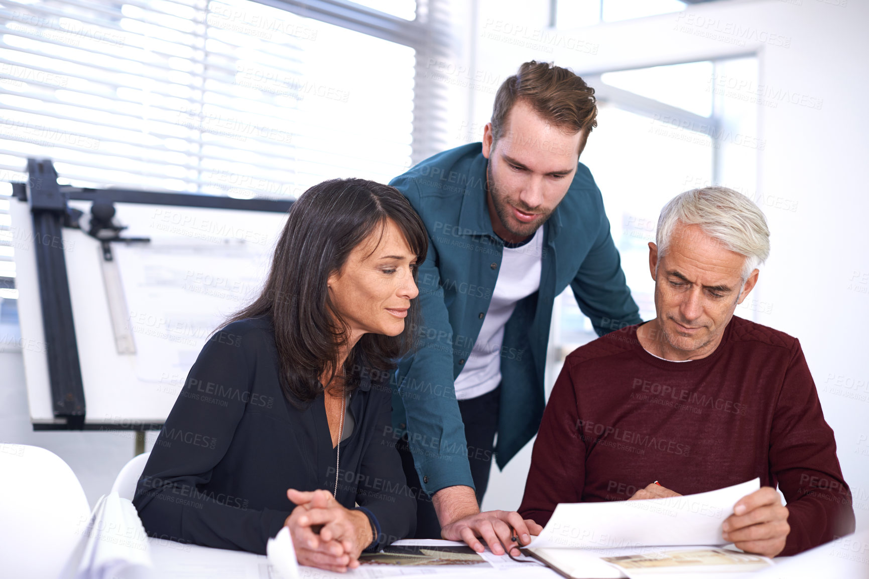 Buy stock photo Architects, teamwork and planning with blueprint, meeting and collaboration in boardroom. Talking, construction or strategy for architecture, contractor or property developer for project management