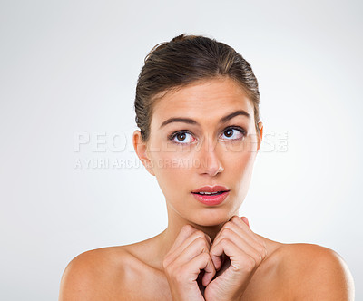 Buy stock photo Woman, thinking and nervous about skincare, beauty  and cosmetics in a studio on white background. Inspiration for antiaging, solution to dry skin and glow with waiting for results from treatment
