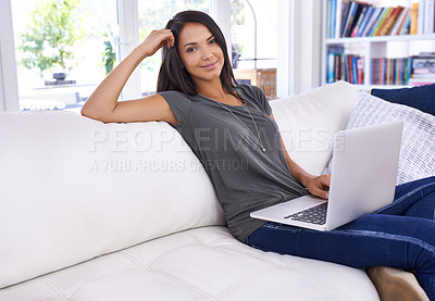 Buy stock photo Portrait, woman and laptop with smile in lounge, working or relaxing or break on couch. Female person, watching or typing in computer, technology and connectivity for results in living room or house
