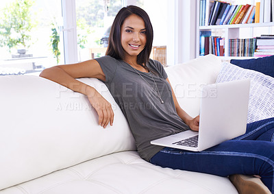 Buy stock photo Portrait, happy woman and laptop in living room, working or relaxing with smile in couch. Female person, watching or typing in computer, technology and connectivity for results in lounge or house