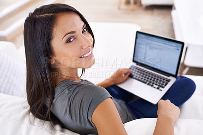Buy stock photo Remote work, laptop screen and woman on a sofa for streaming, planning or research in her home. Freelance, face and female writer with pc display for editing, search or writing digital newspaper
