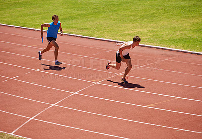 Buy stock photo Athlete, running and race track with relay and teamwork at stadium, fitness and workout outdoor. People in arena, runner and exercise with sports, trust and support for challenge, speed and action