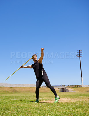 Buy stock photo Man, athlete and javelin throw or sport competition on grass for workout fitness or outdoor, strength or training. Male person, challenge and target strong or exercise performance, aim or wellness