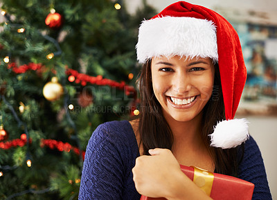 Buy stock photo Christmas, box or portrait of woman with gift in a happy celebration of a Christian holiday in house living room. Smile, face or excited girl holding present with a ribbon to celebrate xmas in Mexico