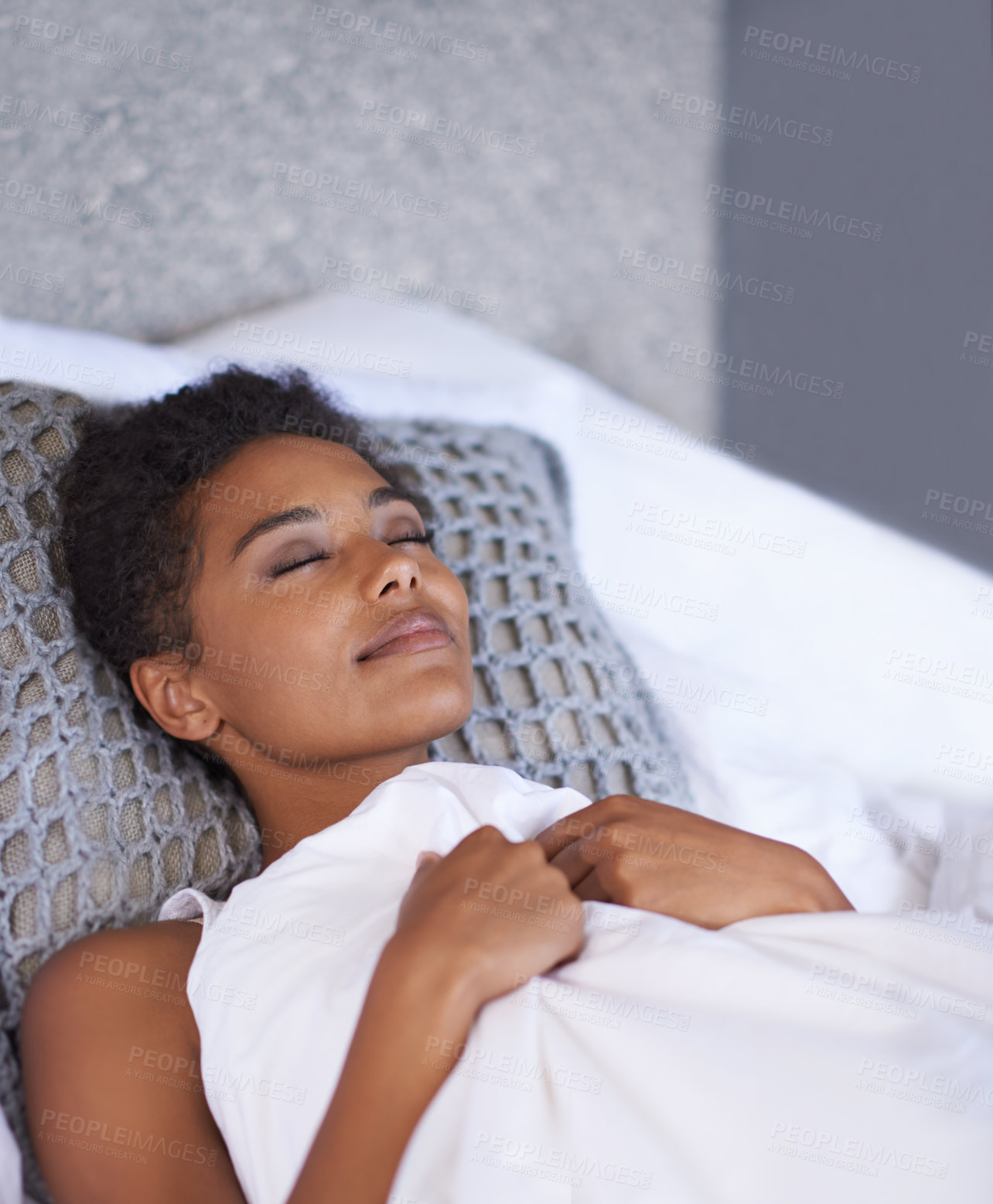 Buy stock photo Black woman, sleeping and bed with duvet sheets for morning, comfort or break at home. Young and tired African female person or model asleep in fatigue for weekend, holiday or peace in the bedroom