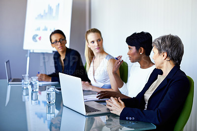 Buy stock photo Meeting, office and business people with laptop in discussion, talking and collaboration. Teamwork, corporate and women with chart, graph and research presentation for planning, review and growth