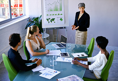 Buy stock photo Business people, meeting and boardroom presentation with graphs teamwork for financial analytics, charts or training. Women, man and paperwork in conference room or company report, review or strategy