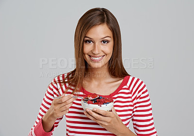 Buy stock photo Woman, bowl and smile with studio, berries and happiness for health and wellness. Person, diet and nutrition with fruit, snack and organic salad for hungry or eating isolated on white background