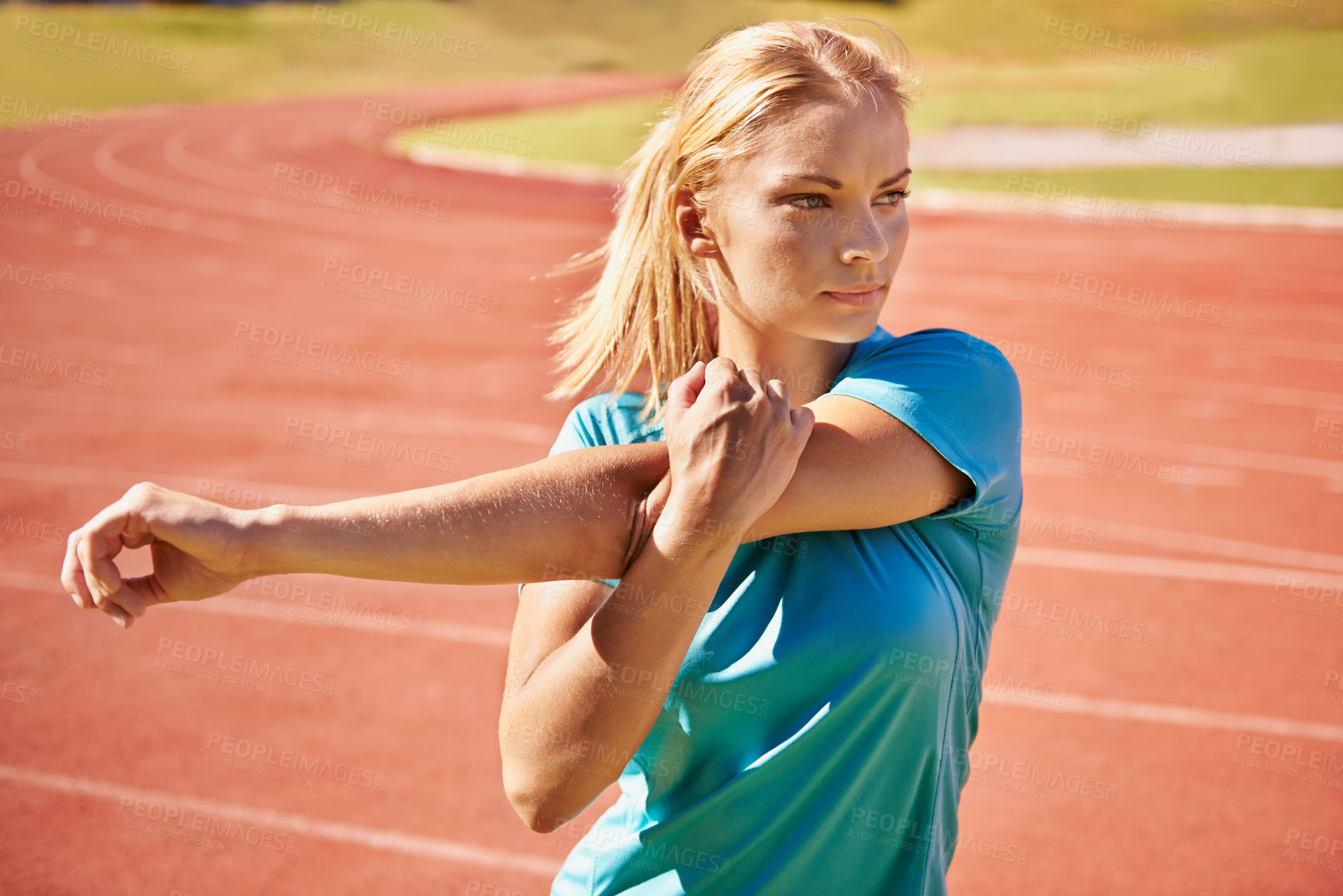 Buy stock photo Runner, arms and woman stretching in stadium for race, marathon or competition training for health. Sports, fitness and female athlete with warm up exercise for running cardio workout on track.