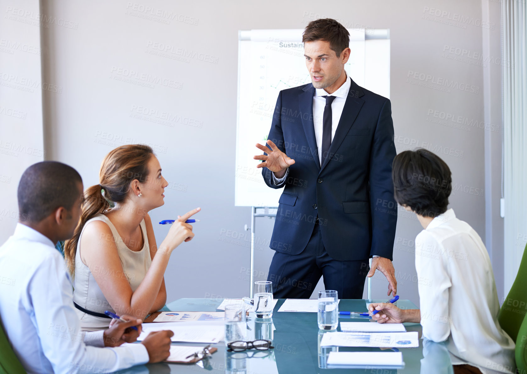 Buy stock photo Business man, workshop speaker and meeting of a corporate management team with financial data. Speaking, businessman and collaboration of accounting staff working in a conference room with strategy