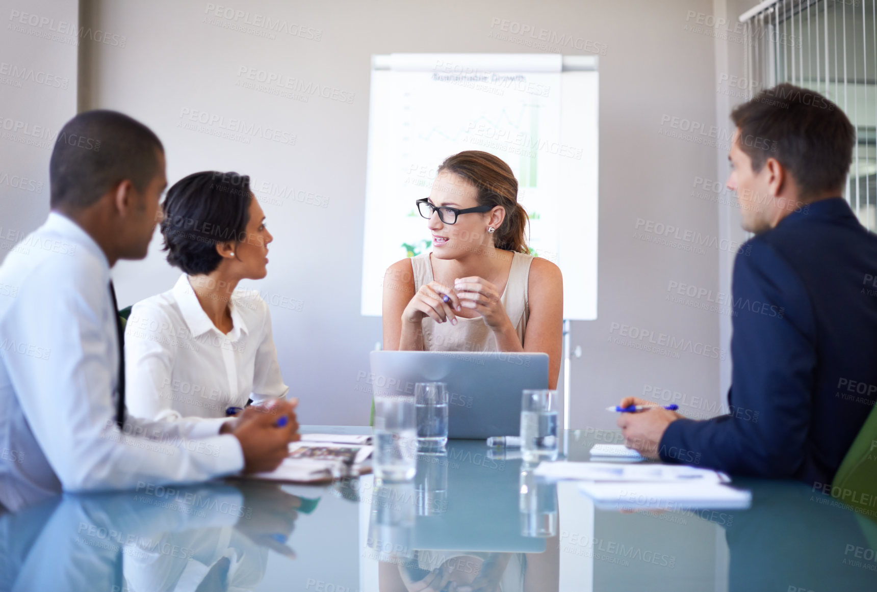 Buy stock photo A group of businesspeople having a meeting in a boardroom