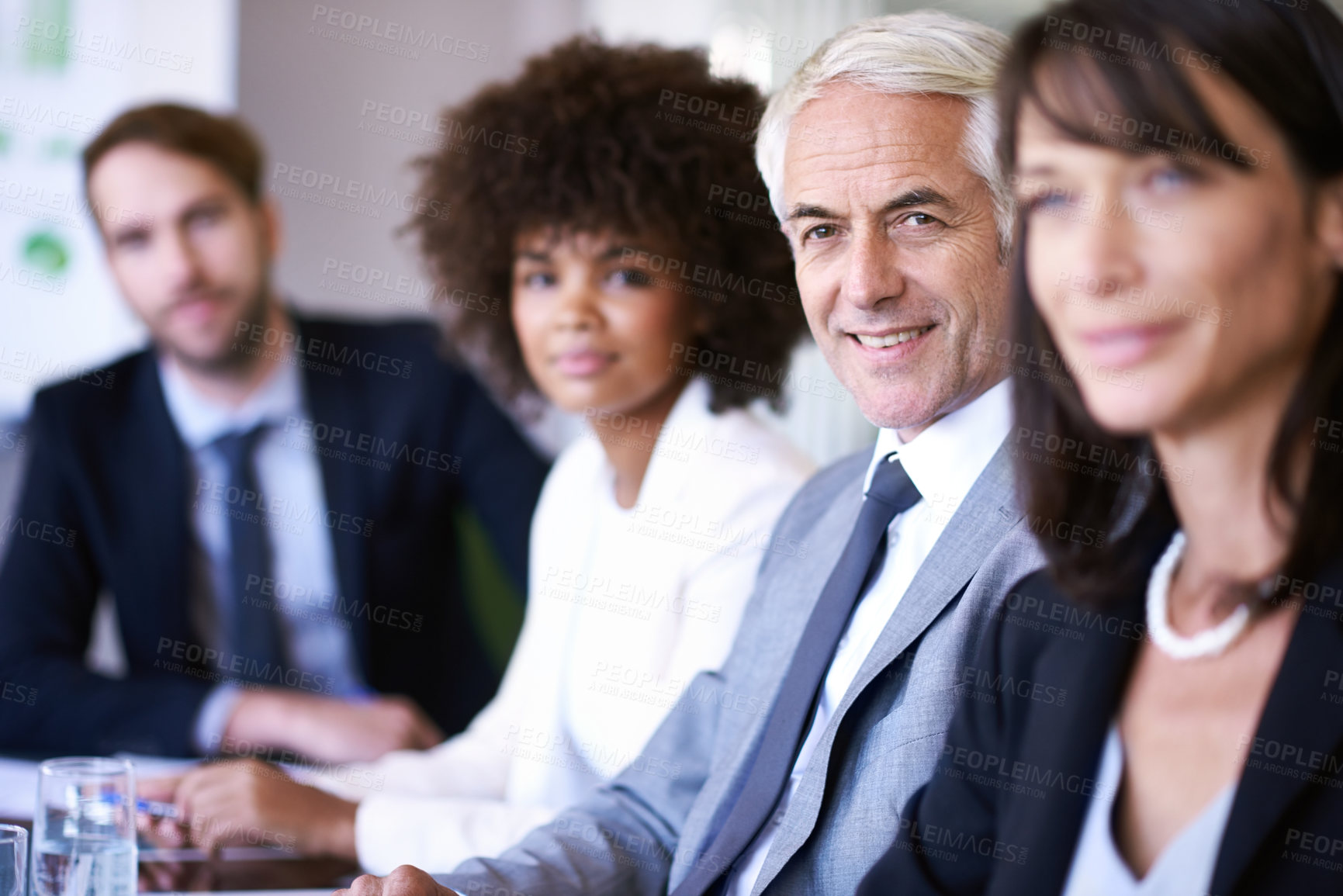 Buy stock photo Portrait, man or executive in business, meeting or discussion of company, corporate or collaboration. Businessman, colleague or team in conference room as professional, teamwork or conversation