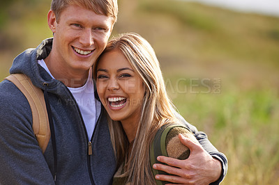 Buy stock photo Happy, love or portrait of funny couple hug in nature for hiking, bonding or fun with joke, humor or comic. Laugh, face or people on countryside field on adventure, journey or trekking travel trip