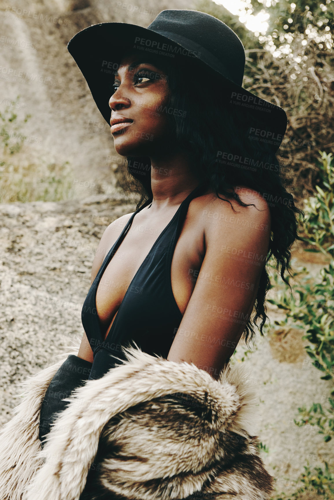 Buy stock photo Cropped shot of an attractive woman posing on the beach