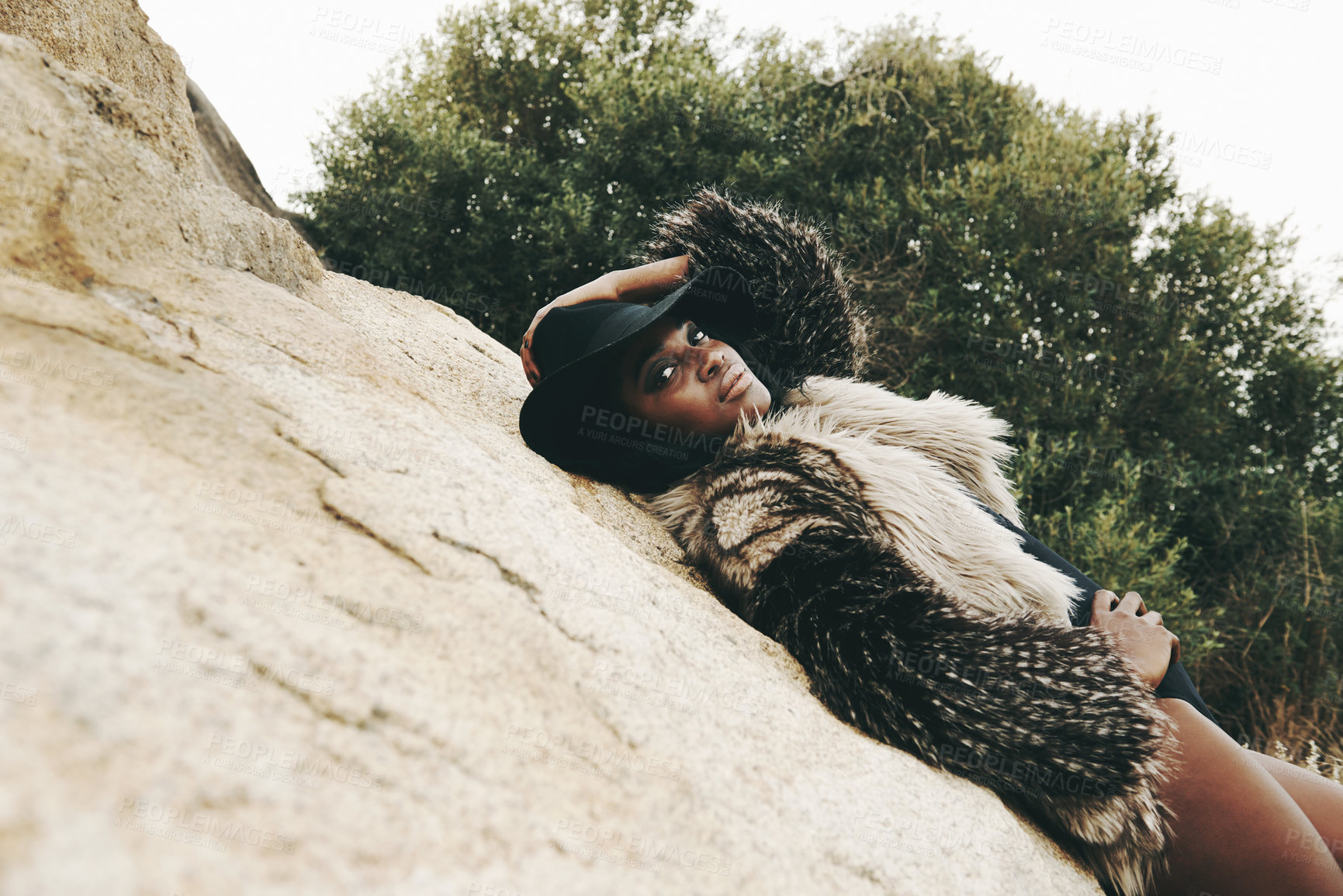 Buy stock photo Cropped shot of an attractive woman posing on the beach