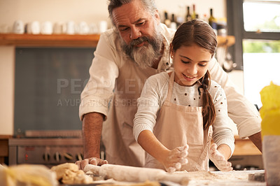 Buy stock photo Girl, child and grandfather with dough in kitchen for cooking, baking and teaching with support or helping. Family, senior man and grandchild with cookies preparation in home for bonding and learning