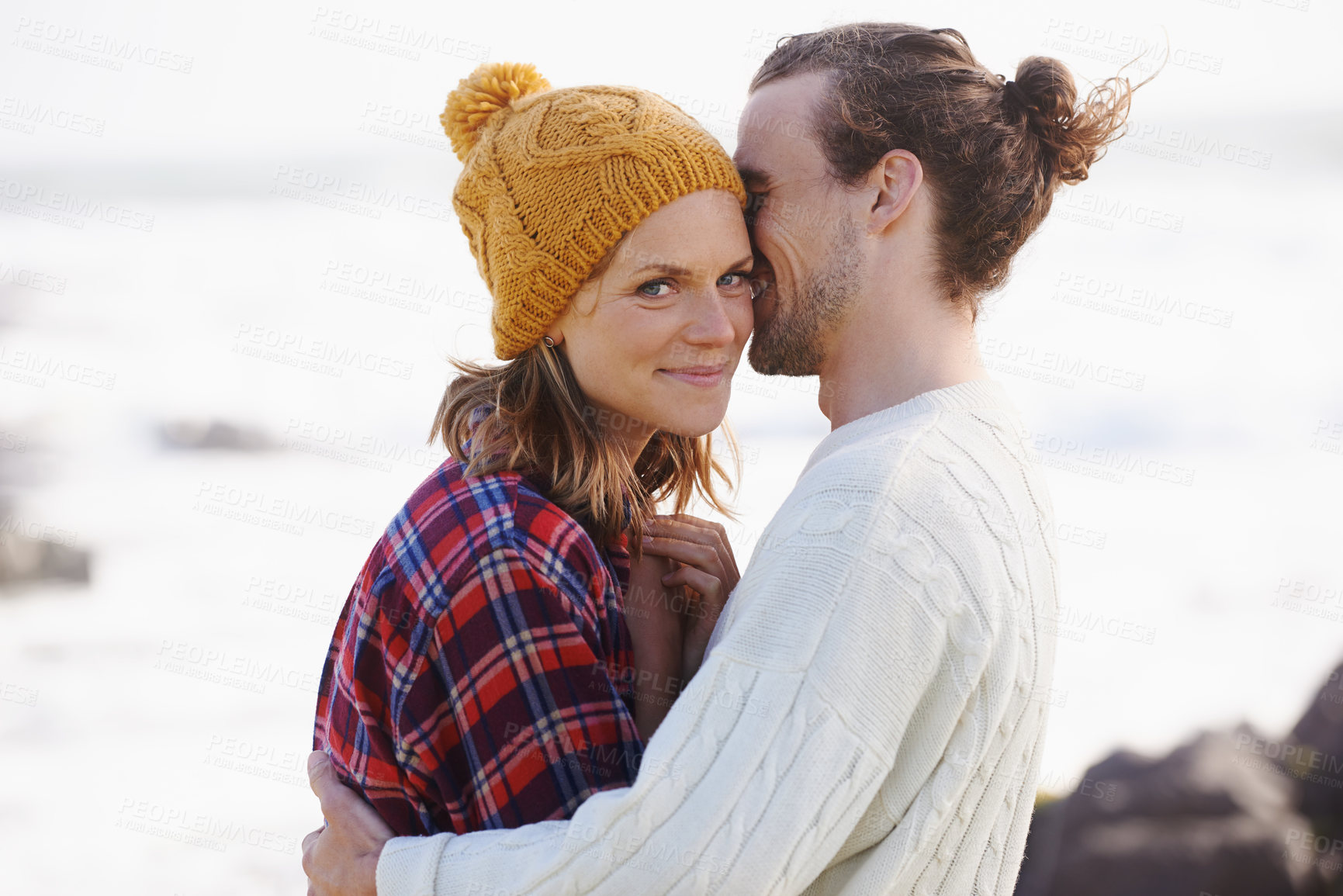 Buy stock photo Love, smile and couple on beach in summer together for holiday, romance or vacation on island coast. Nature, travel or getaway with happy young man and woman hugging by ocean or sea for bonding