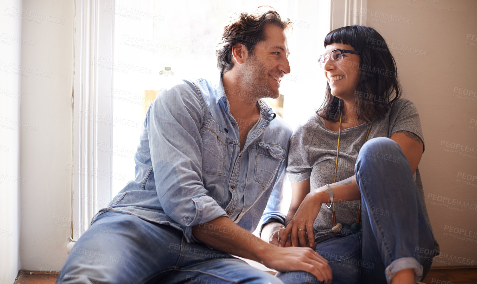 Buy stock photo Floor, laughing or happy couple talking in home living room in conversation or speaking together. Man, funny woman or romantic people in apartment or house with love, support or joke humor to relax