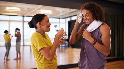 Buy stock photo People, drinking water and break in dance studio, smile and relax from practice or learning routine. Partners, happy and laugh for humor in training, hydration and nutrition for exercise or workout