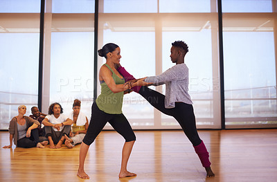 Buy stock photo Stretching, women and dance in studio with partner, personal trainer and happy African friends together for fitness. Rhythm, moving and people in gym for practice, performance and flexibility of legs