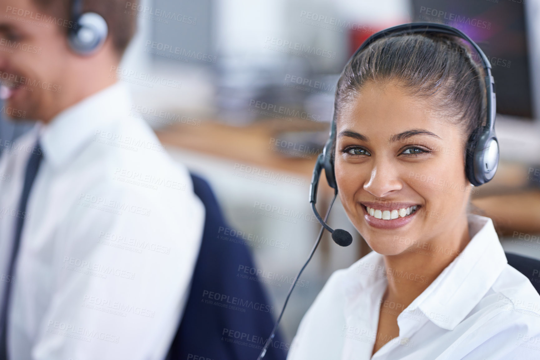 Buy stock photo Shot of a young woman wearing a headset