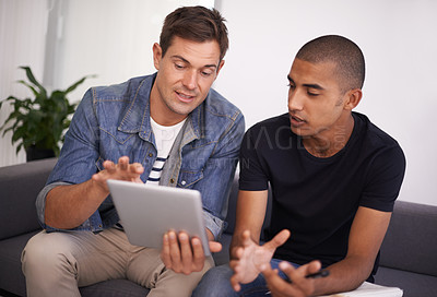 Buy stock photo Tablet, teamwork and discussion with man design team in office lounge together for meeting or planning. Business, collaboration and creative with colleague talking to designer coworker in workplace