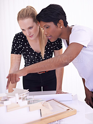 Buy stock photo Model, blueprint or people with engineering teamwork for development project or planning on paper. Architecture, women or group of designers talking in collaboration for floor plan of office building
