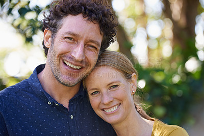 Buy stock photo Cropped shot of an affectionate husband and wife standing outdoors