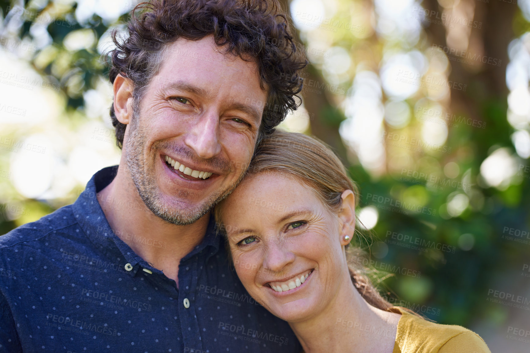 Buy stock photo Cropped shot of an affectionate husband and wife standing outdoors
