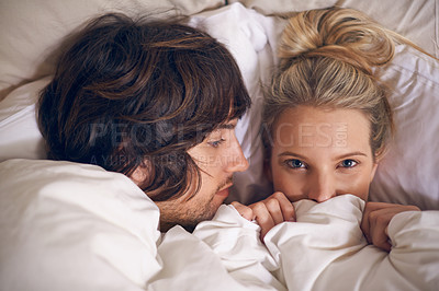 Buy stock photo Love, blanket and couple relax in a bed with trust, care and safety, support and security in their home from above. Rest, cuddle and people in a bedroom for afternoon, weekend or day off nap in house