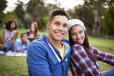 Buy stock photo Couple, smile and portrait with love in park for bonding and fun on campus outdoor. Students, grass and happy together in a university garden on a break on a picnic with college people with care