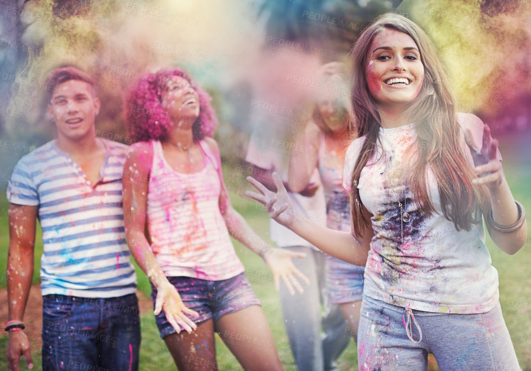 Buy stock photo Shot of happy friends having fun with powder paint