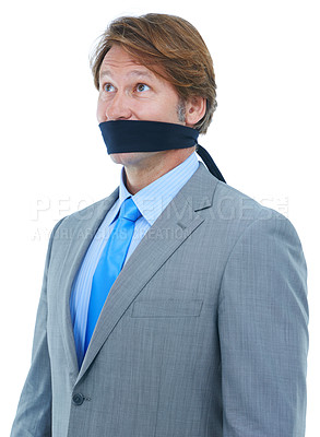 Buy stock photo Studio, silence and businessman in suit for corporate company as executive in career or job. White background, employee and male person with cover on mouth by management in workplace for secret