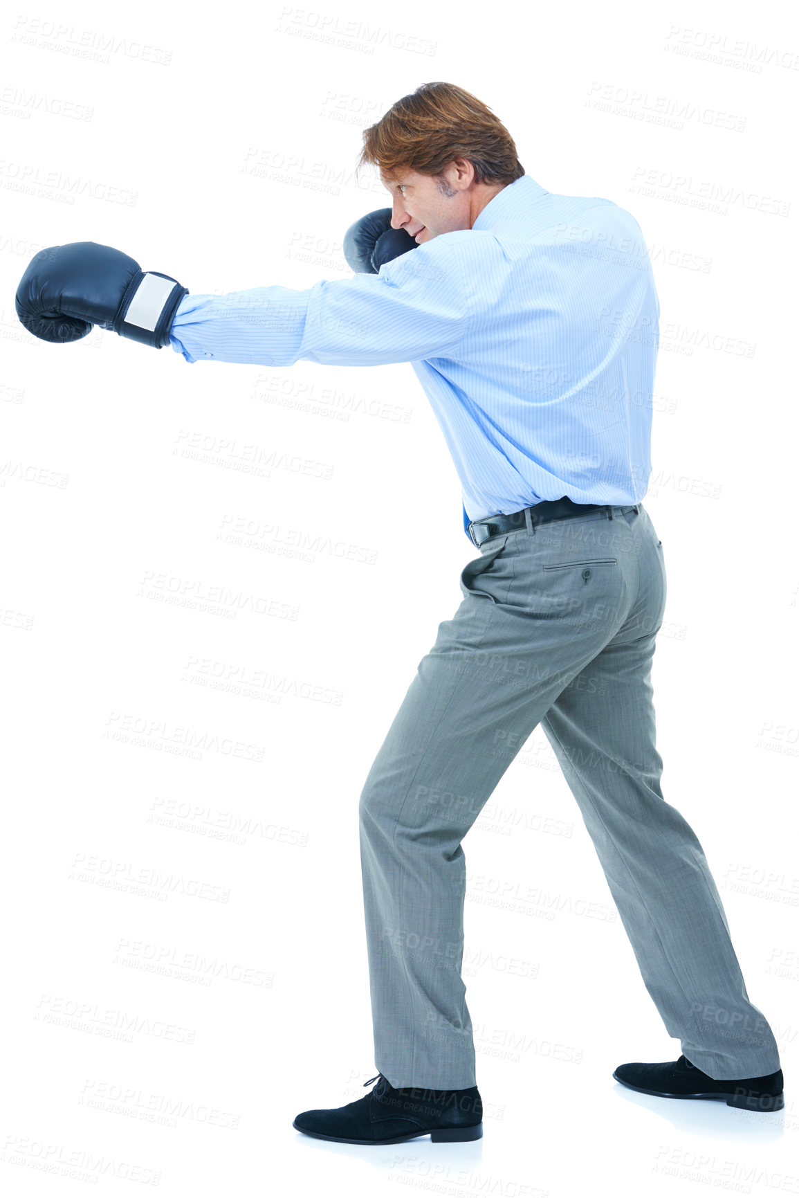 Buy stock photo Businessman, punch and boxing gloves in studio for competition, corporate opportunity and victory at work. Male person, pride and confidence to fight for promotion on white background with smile