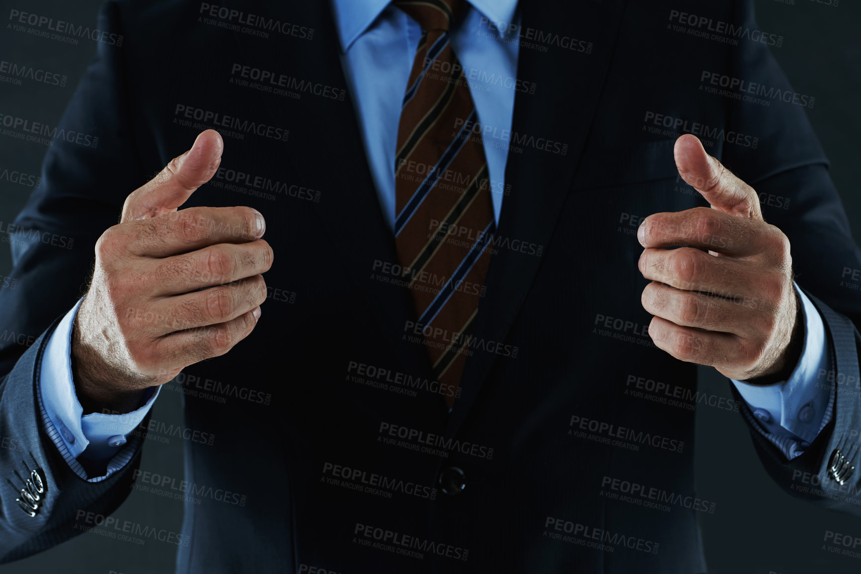 Buy stock photo Shot of an unrecognizable businessman gesturing with his hands