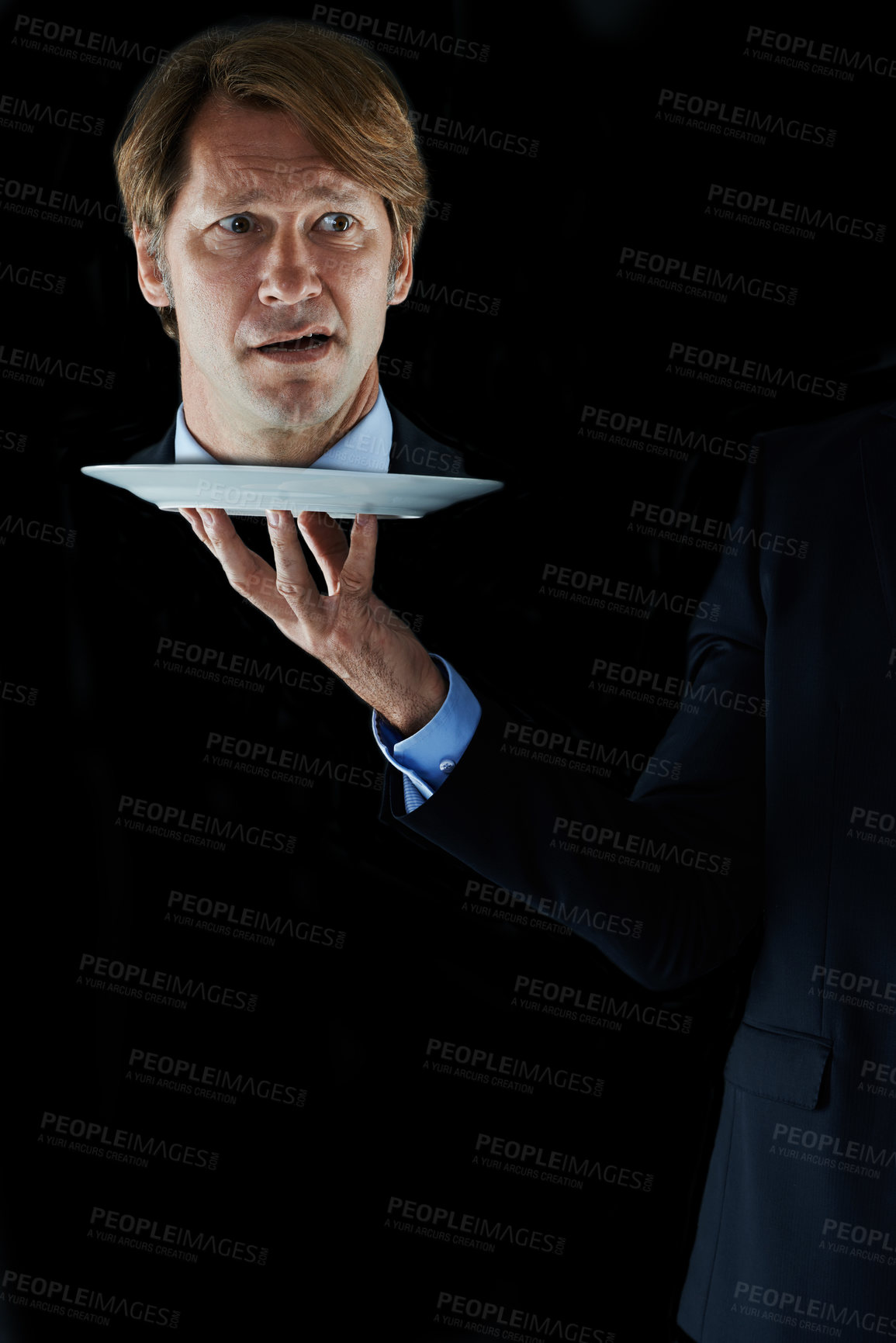 Buy stock photo Shot of a businessman's head on a plate