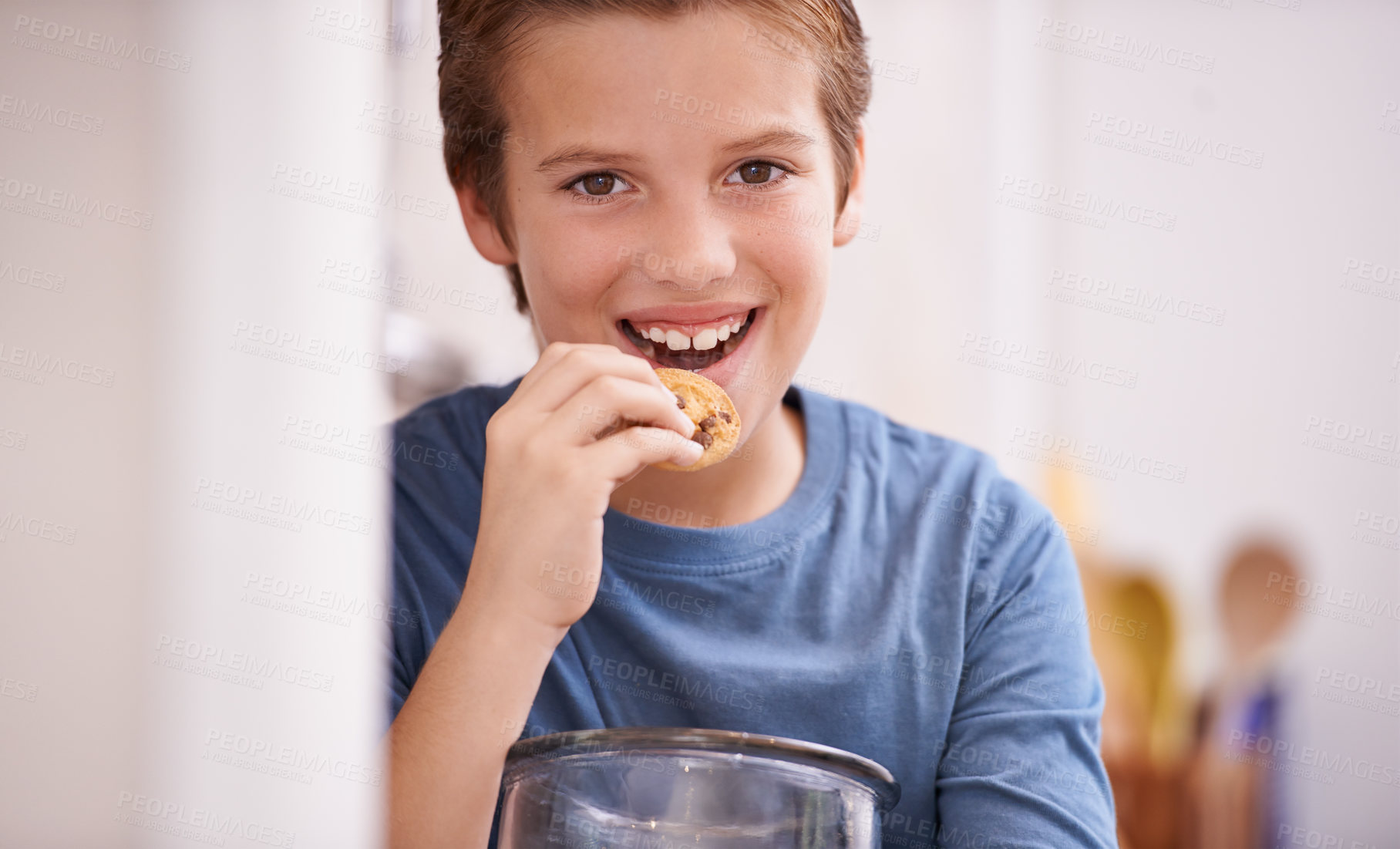 Buy stock photo Eating, cookies and happy portrait of child in home with glass, container or jar of sweets in kitchen. House, snack and kid craving a taste of sugar from addiction to biscuit and unhealthy food