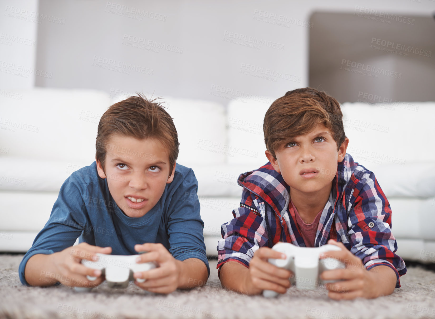 Buy stock photo Boys playing video game, friends and confused while gaming in challenge, competition and concentration. Gamer kids, doubt or console games at home, youth and male children with esports or controller